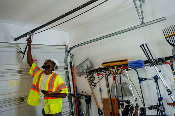 Professional Garage Door Panel Replacement technician working in Melrose, MA